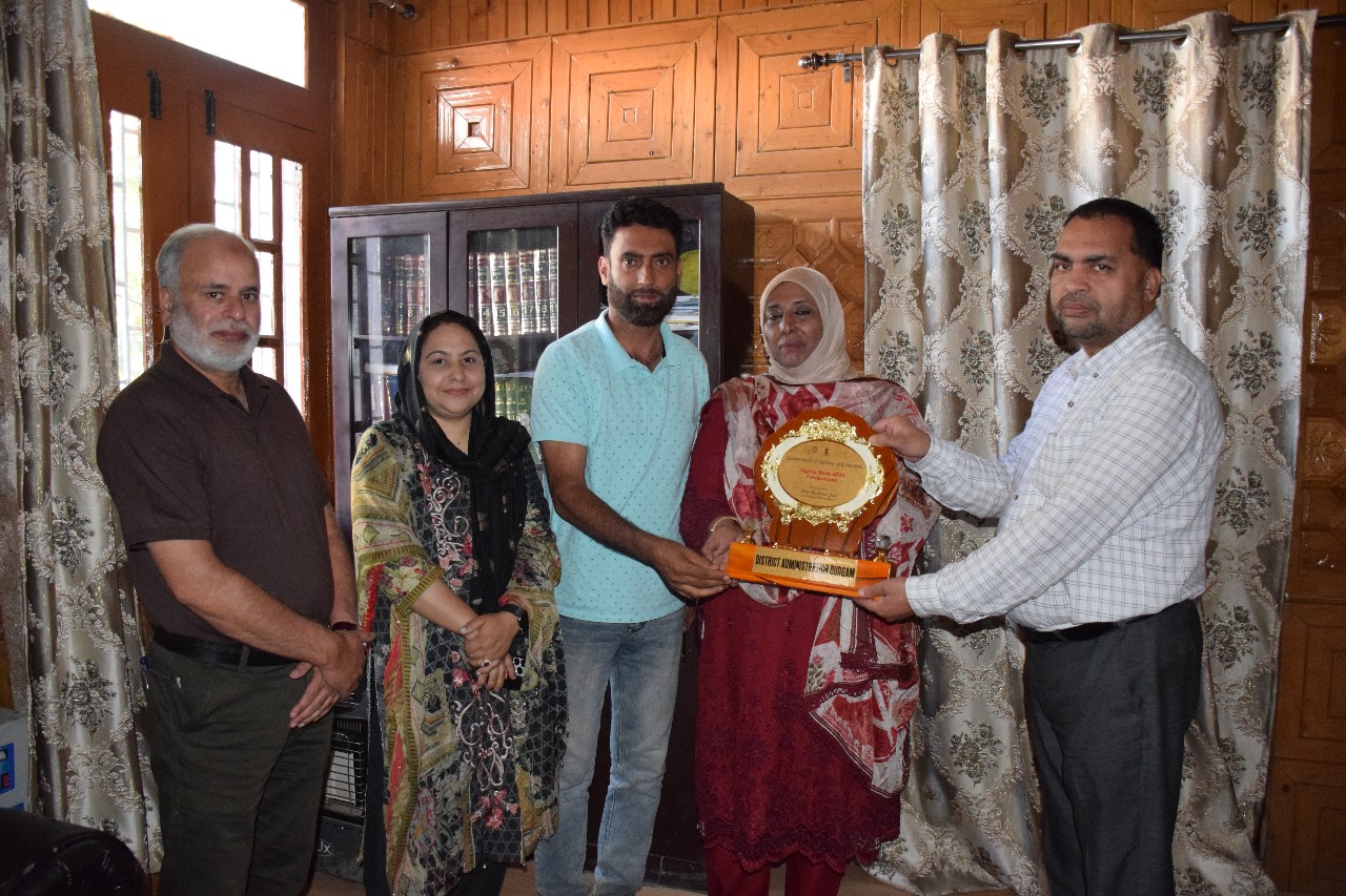 Chief education officer Budgam Madam Romana Qazi , being felicitated by District Administration on a
